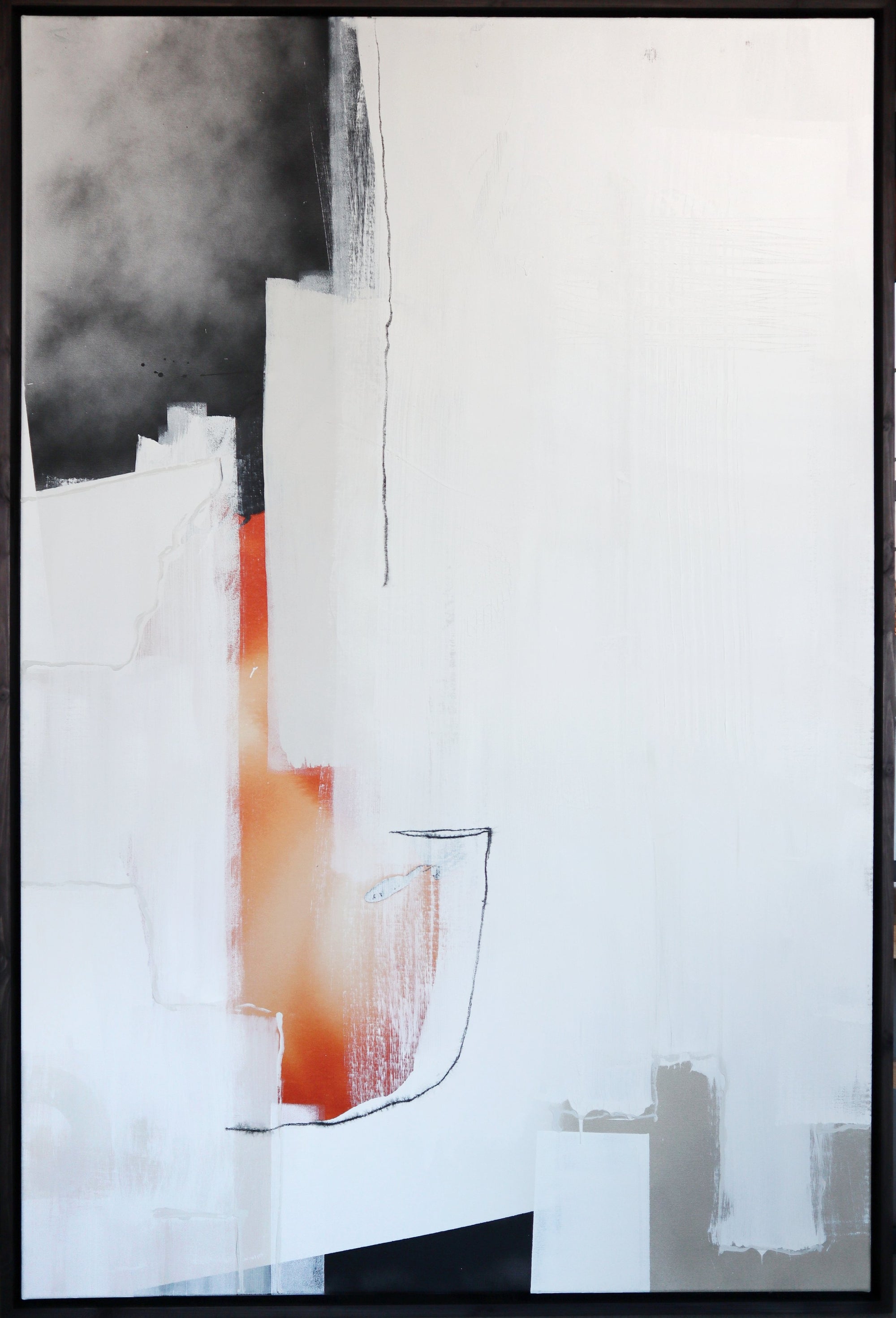 A modern abstract acrylic painting with bold black, white, red, and gray colors on a gallery-wrapped canvas, with a handmade black stained pine wood frame.