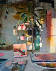 Lotta Sirén's art studio with various paintings and art supplies