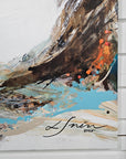 A close-up of "Gone with the Wind" abstract painting with textured surface and tones of orange, blue, beige, brown and white and signature in bottom the right corner