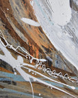 A close-up of "Gone with the Wind" Abstract art with white paint textures on a brown, blue and gray background
