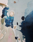 Close-up of a semi-abstract artwork "Standing Tall" with splashes of blue, black, and white on a textured surface