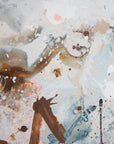 Abstract painting with layered textures of brown, beige, light blue, and white, featuring paint splatters, drips, and brushstrokes.