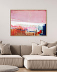 Detours Approved - Limited Edition Canvas Print with oak frames. Pink, white and burnt sienna tones and a hint of red & blue. Structured and vibrant piece on a wall above a couch.
