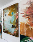 Abstract paintings on a white wall