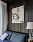 Empowering abstract artwork by Lotta Sirén above a sofa.