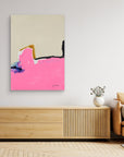 NO MATTER - Limited Edition Canvas Print with beige, bright pink and blue, black and ocher details. Structured minimal abstract canvas print on a wall above a TV stand.