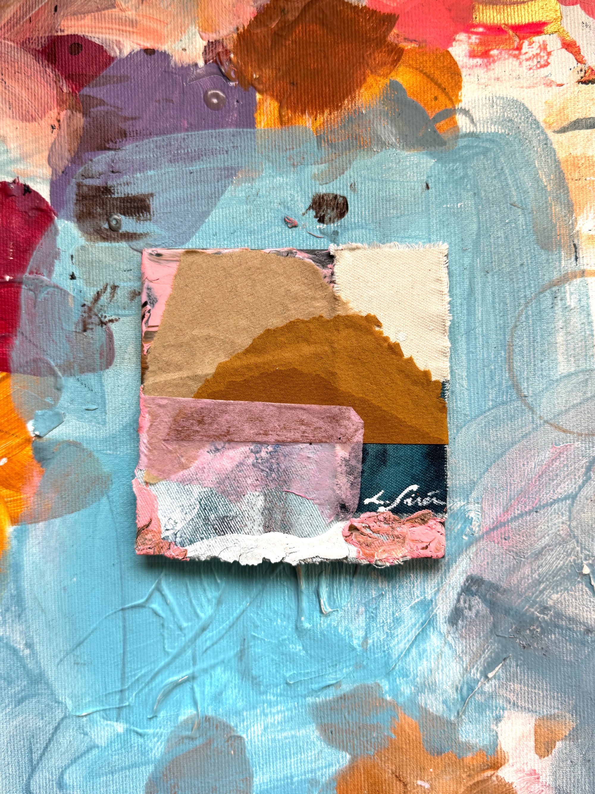 Ceramic abstract art piece with a central rectangular section surrounded by colorful abstract shapes.