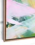 Abstract painting with colorful brush strokes and a signature on a white wall.