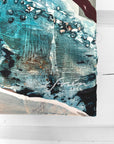 Abstract art piece with blue, black, and white colors on a white background by Finnish artist Lotta Sirén