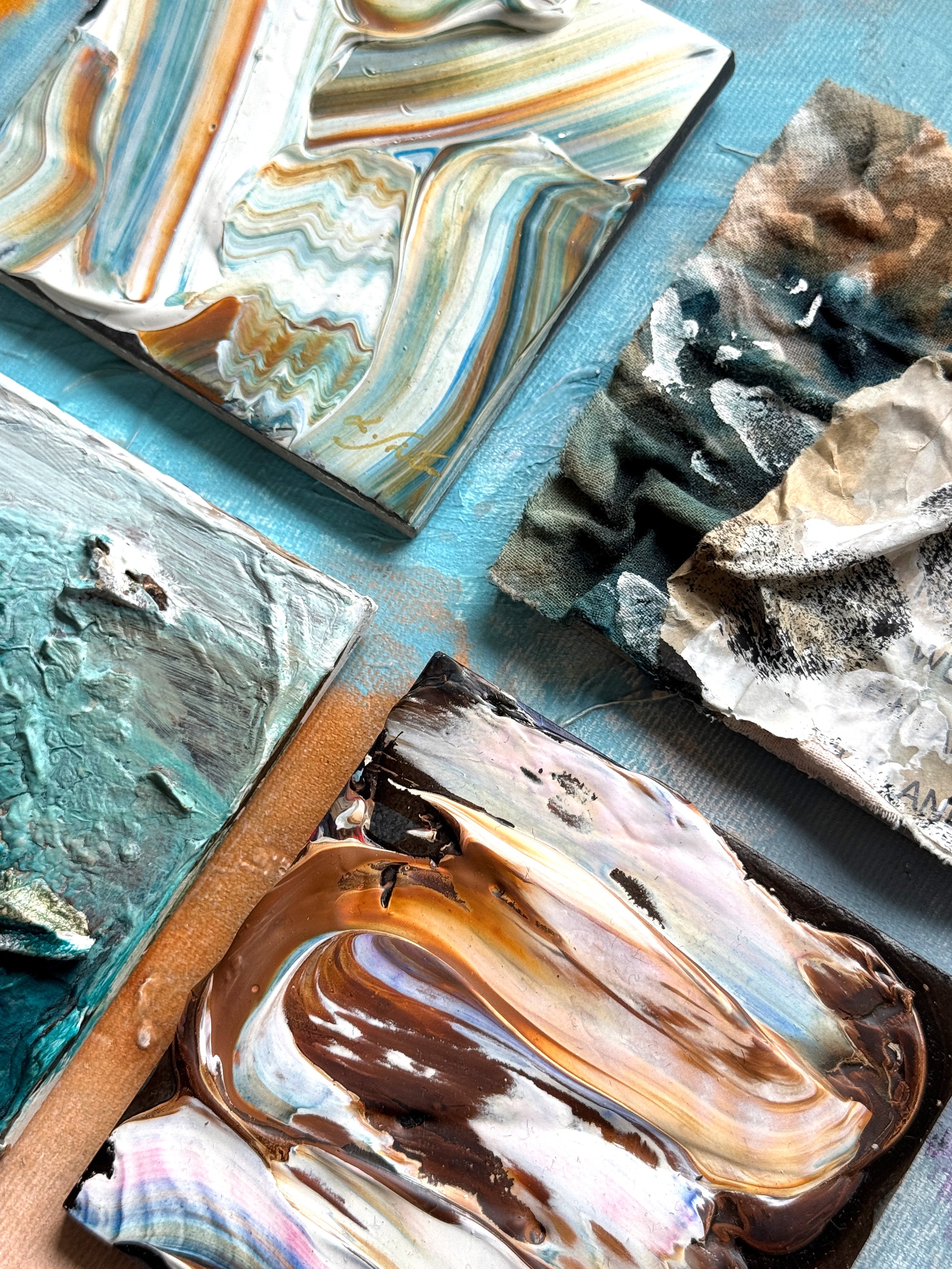 Ceramic textured abstract artworks on a colourful surface