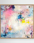 UFO (& other flying vehicles) - Canvas Print. A semi-abstract canvas print with oak frame. Light and airy piece with off-white, pastel tones and blue, pink and yellow hues.