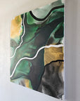 Empowering abstract art by Lotta Sirén with green and gold.