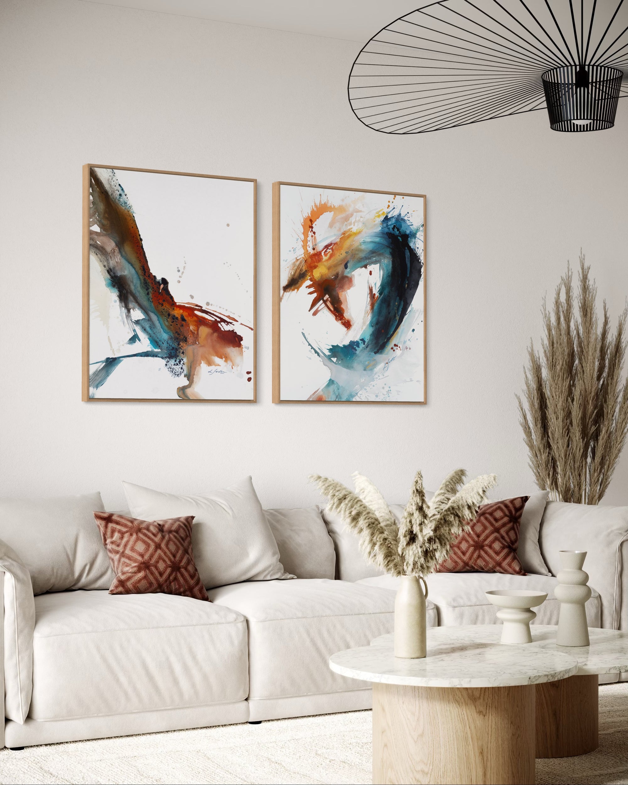 Living room with abstract art on the wall, a white sofa, and decorative elements.