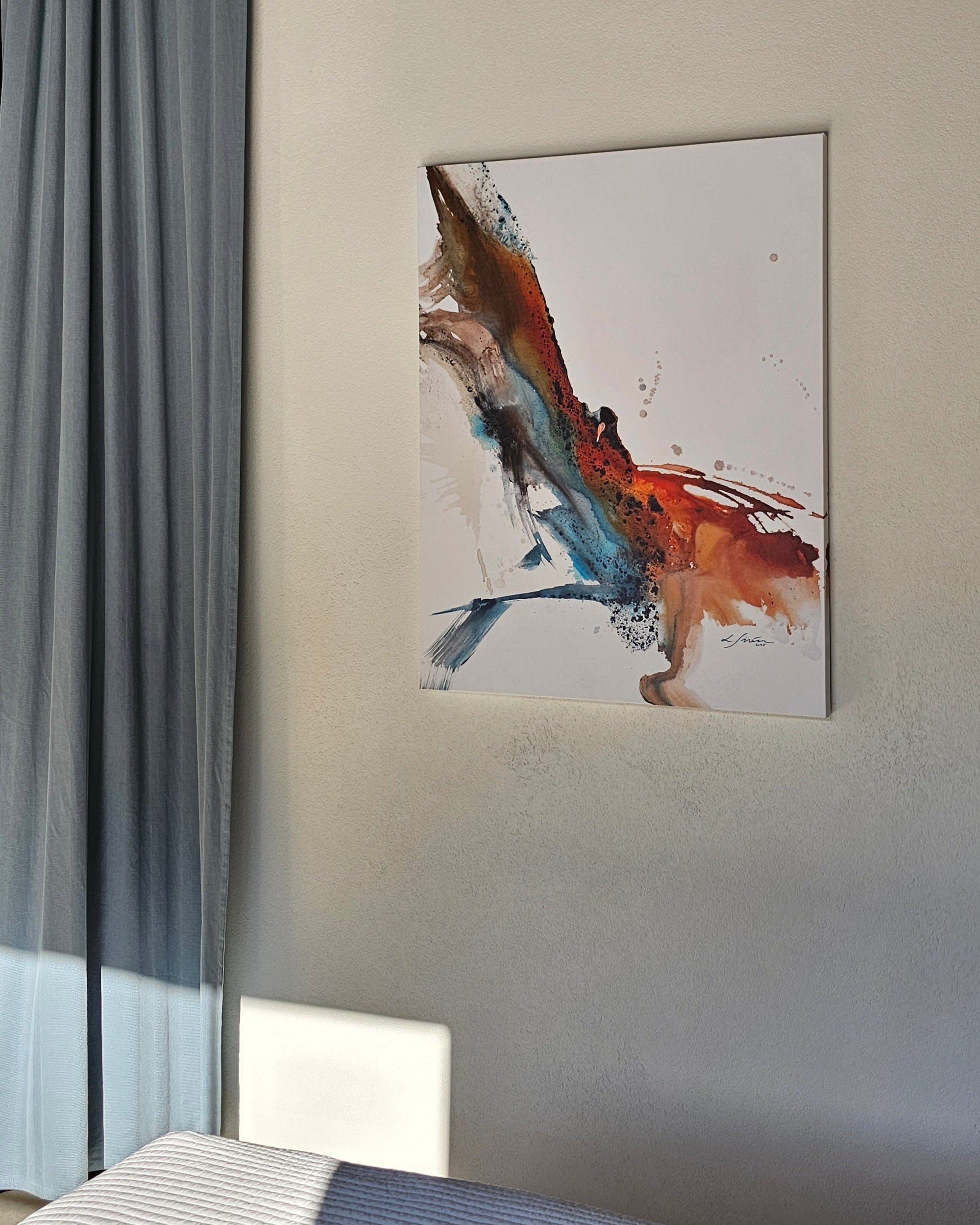 Abstract Phoenix painting by Lotta Sirén on a wall with a curtain.