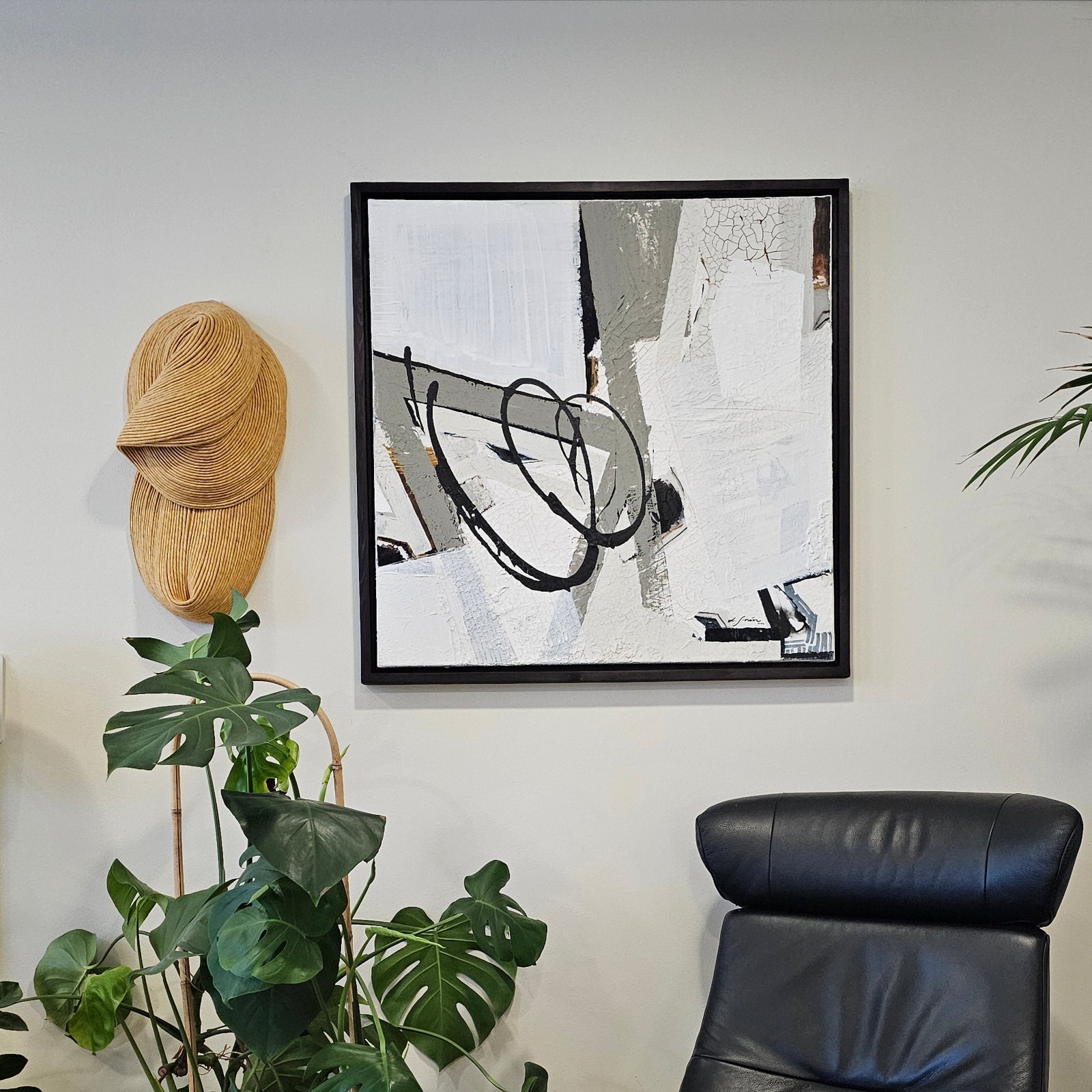 Empowering abstract artwork by Finnish Lotta Sirén in a modern japandi livingroom.
