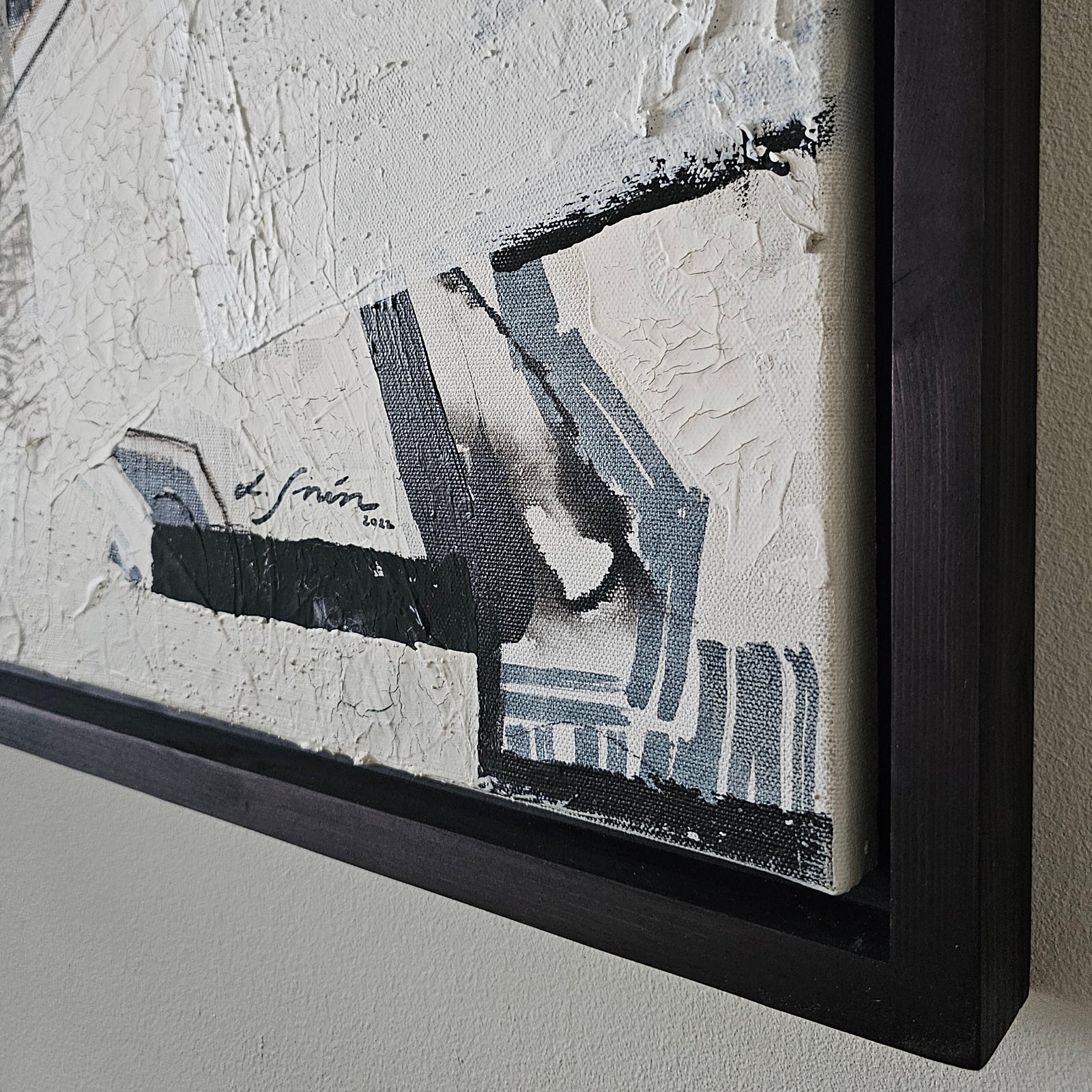 Framed abstract artwork by Lotta Sirén with a textured white background