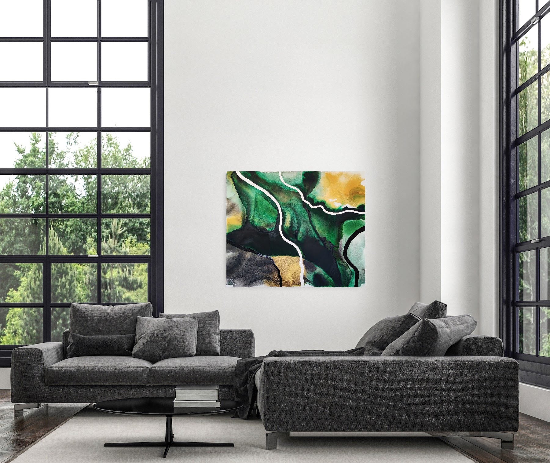 Modern living room with gray sofa, empowering abstract art by Lotta Sirén on wall, and large windows.