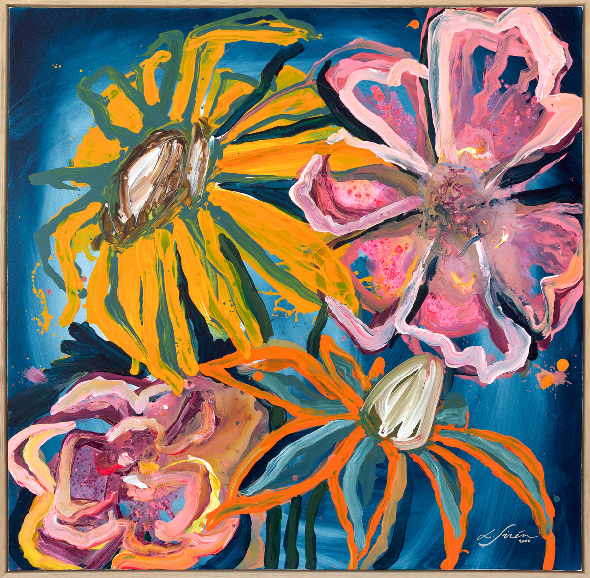 An abstract floral painting featuring large stylized flowers in yellow, pink, orange, and white on a deep blue background, framed in light wood.