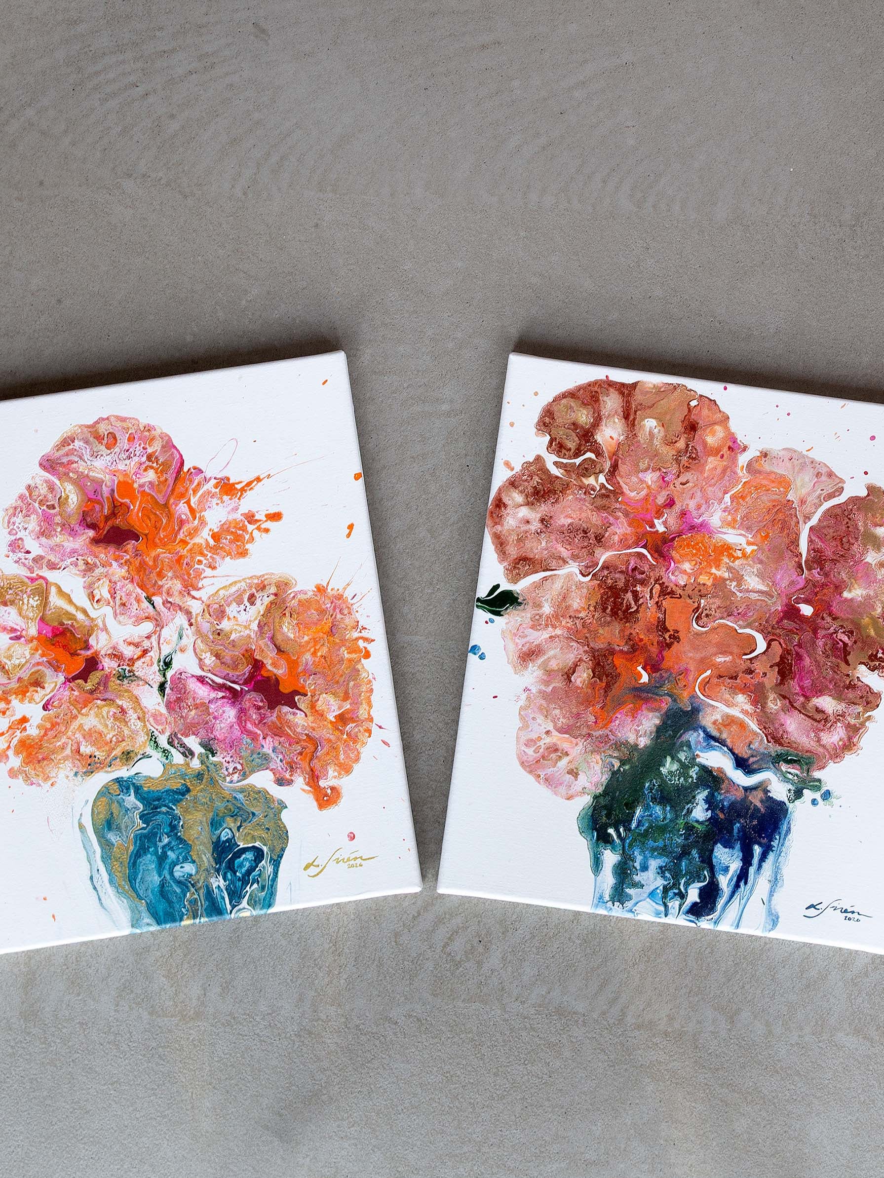 Two semi-abstract floral paintings on a textured surface