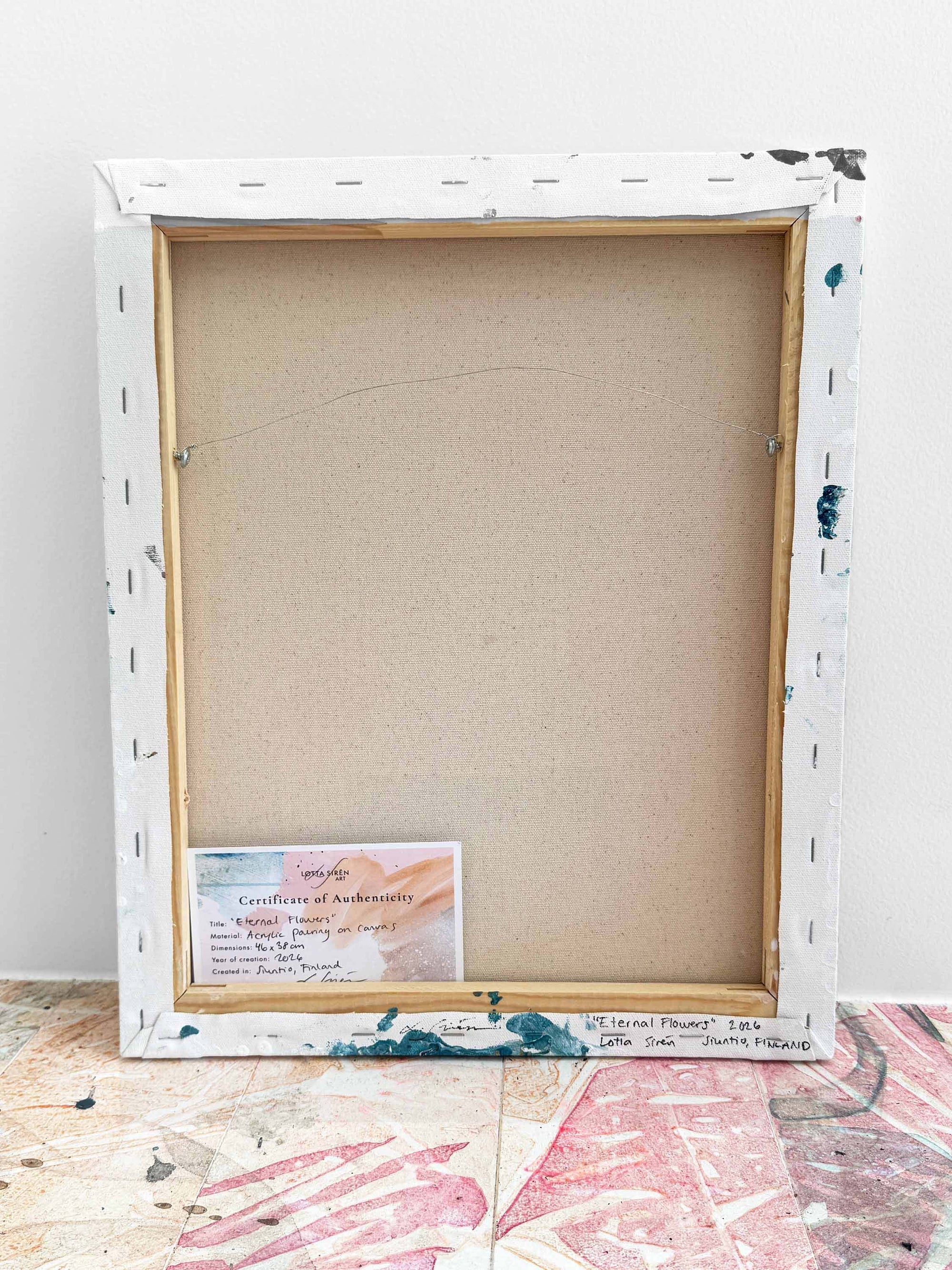 A backside of a semi-abstract painting by Lotta Sirén