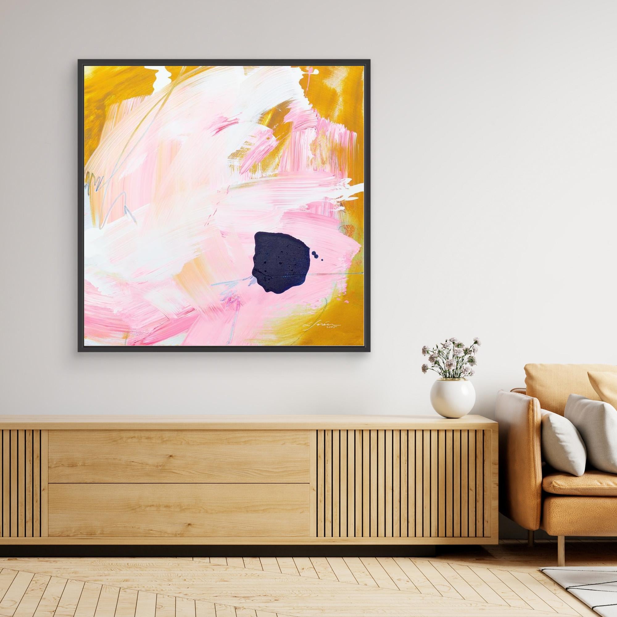 Free - Limited Edition Canvas Print with bold strokes, ocher, white and pink tones and an accent of blue. Abstract canvas print with black frames above a TV stand. 
