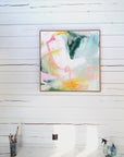 Abstract painting on a white wooden wall with art supplies below by Finnish abstract artist Lotta Sirén