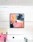 Abstract painting on a white wall with art supplies below by Finnish artist Lotta Sirén