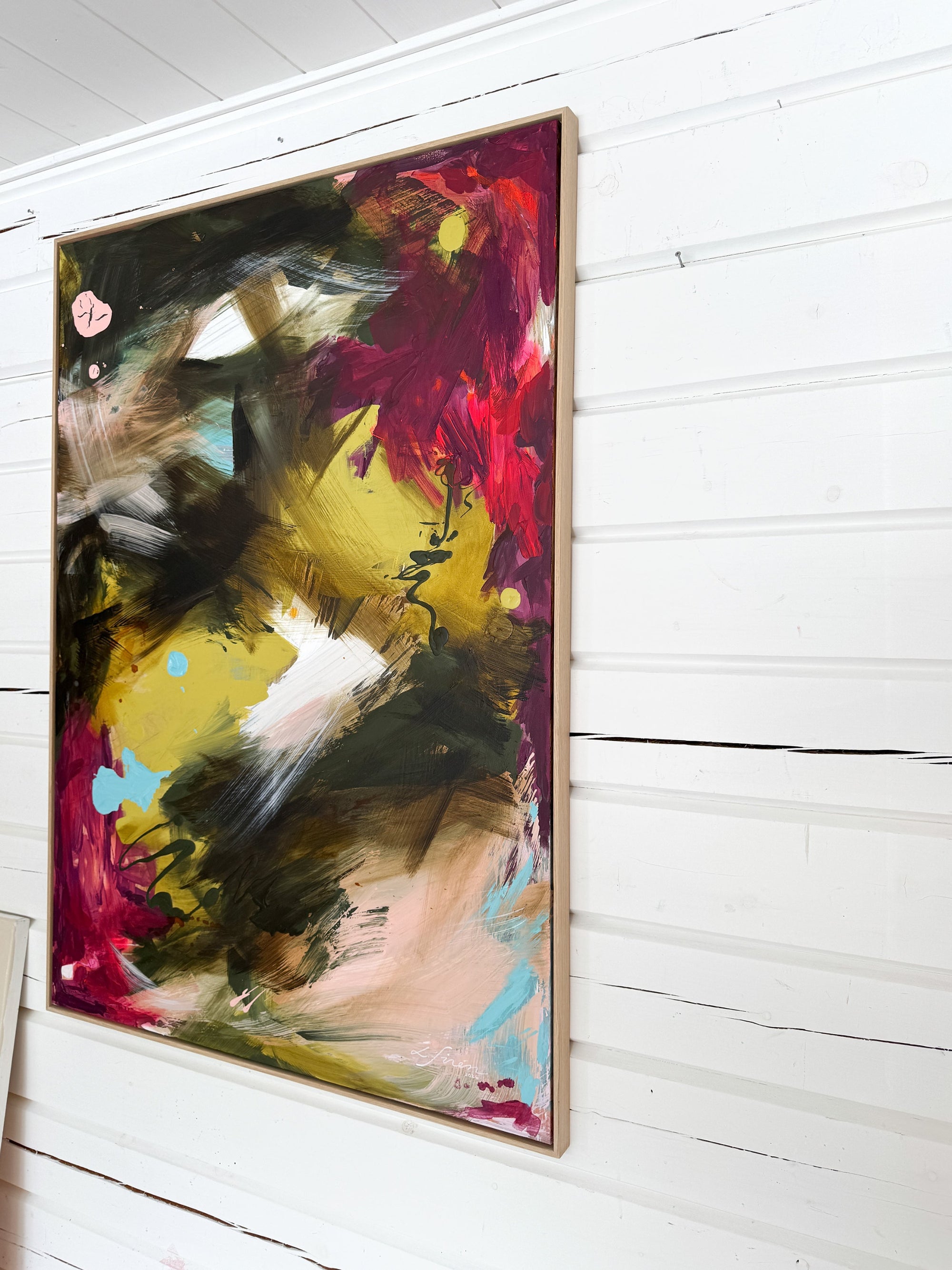 Colorful abstract painting by Finnish emerging artist Lotta Sirén on a white 