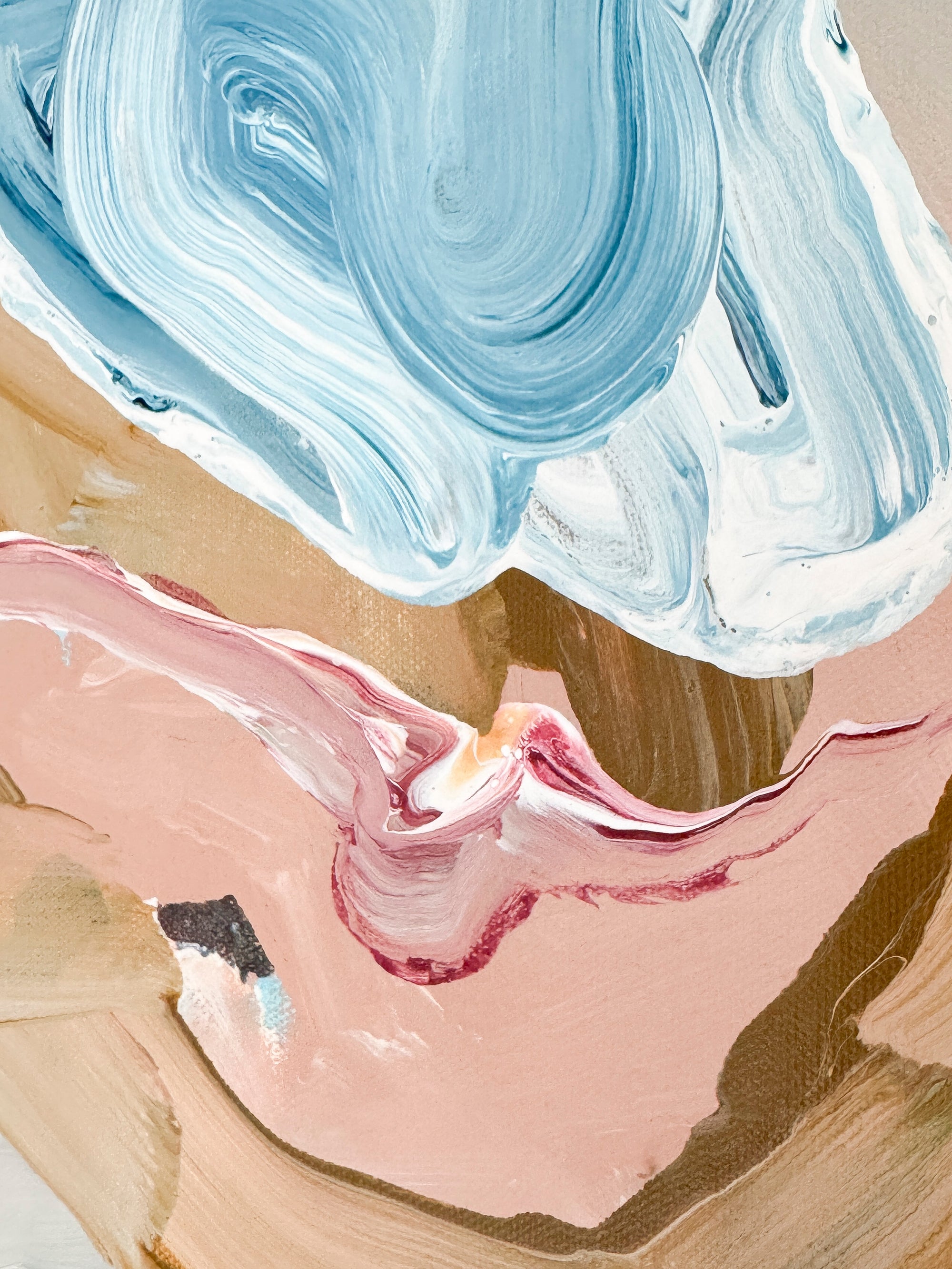 Abstract art with blue, pink, and beige colors on a textured surface