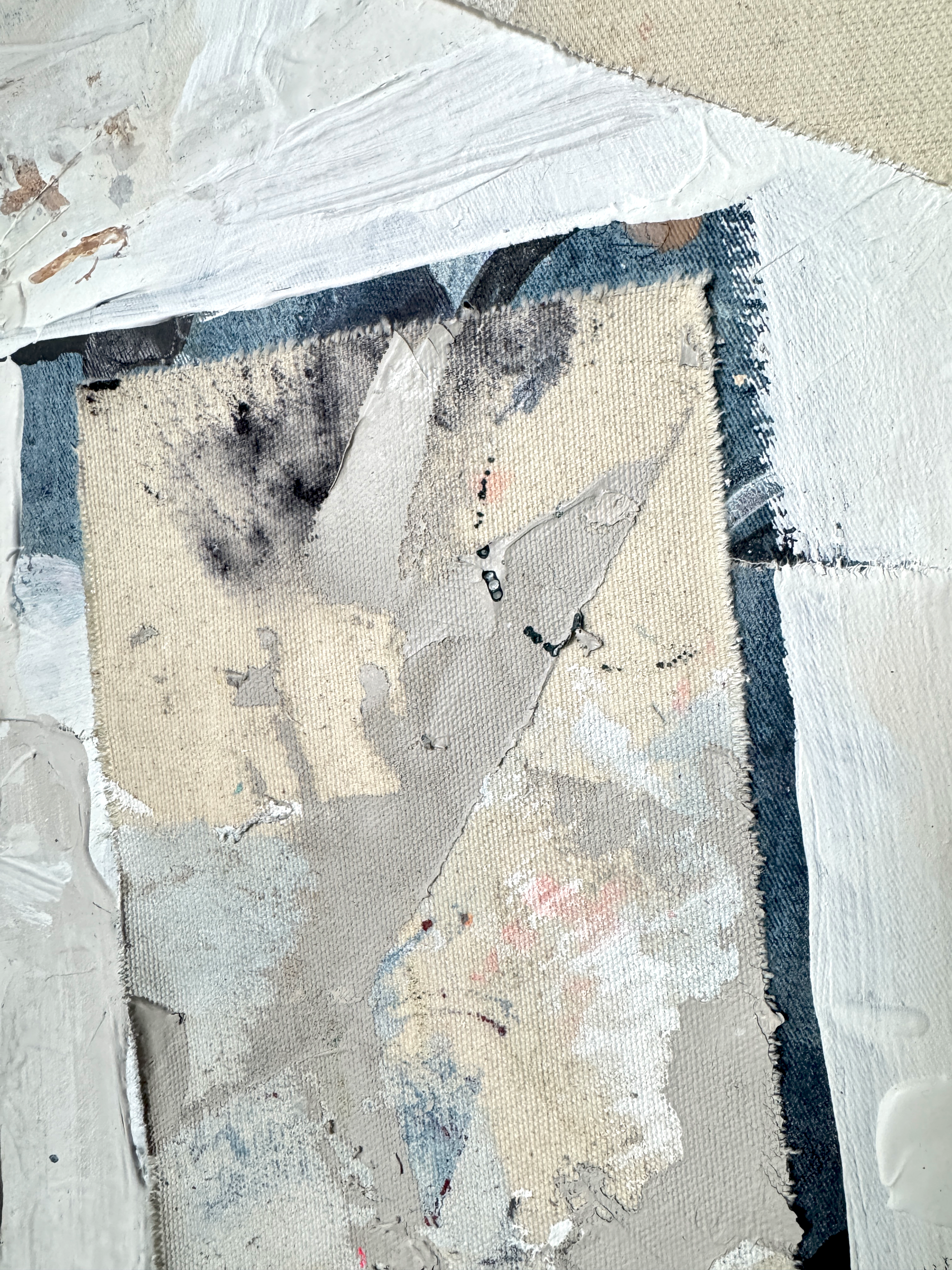 Abstract art piece with textured surface and color variations