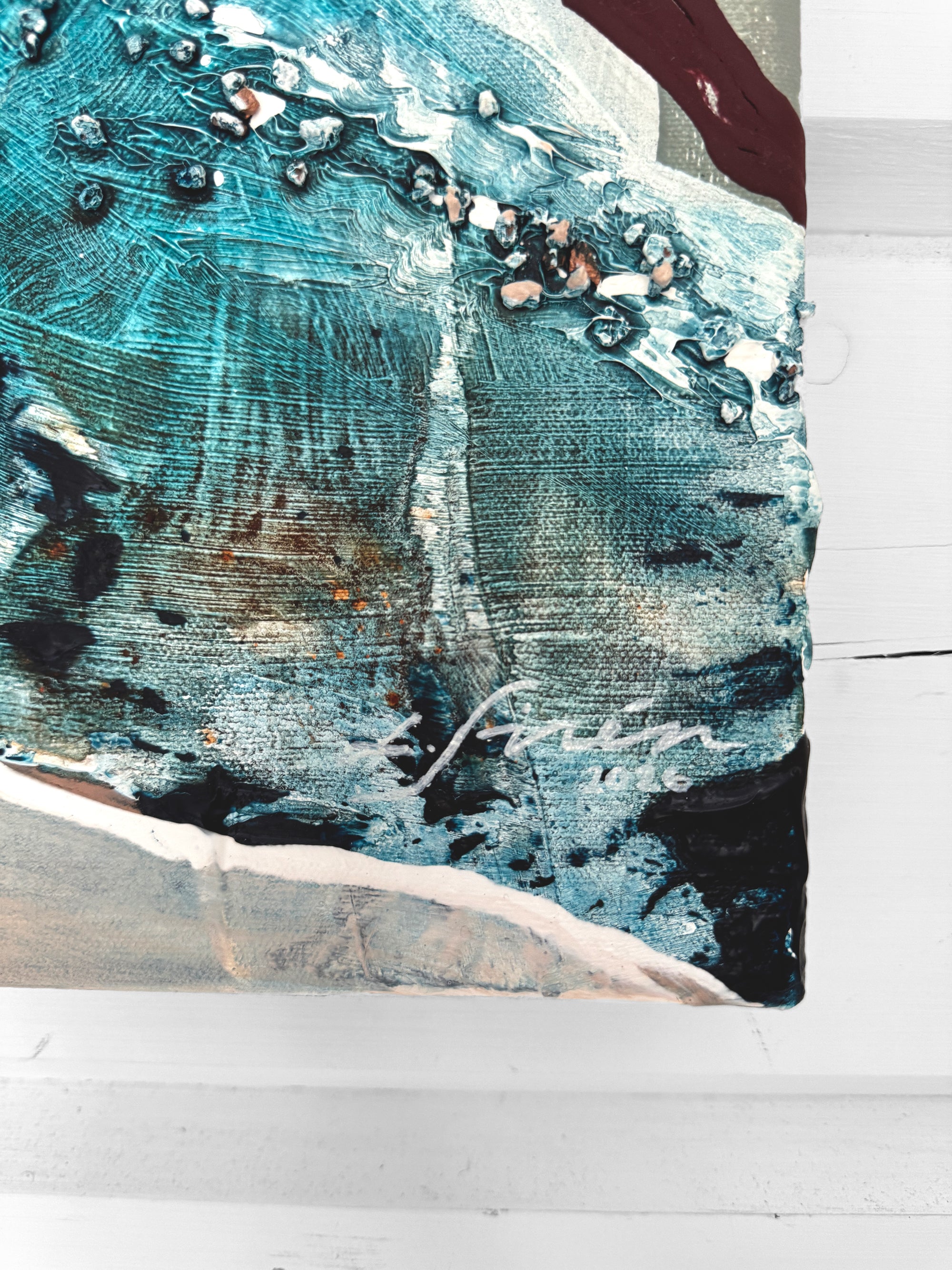 Abstract art piece with blue, black, and white colors on a white background by Finnish artist Lotta Sirén