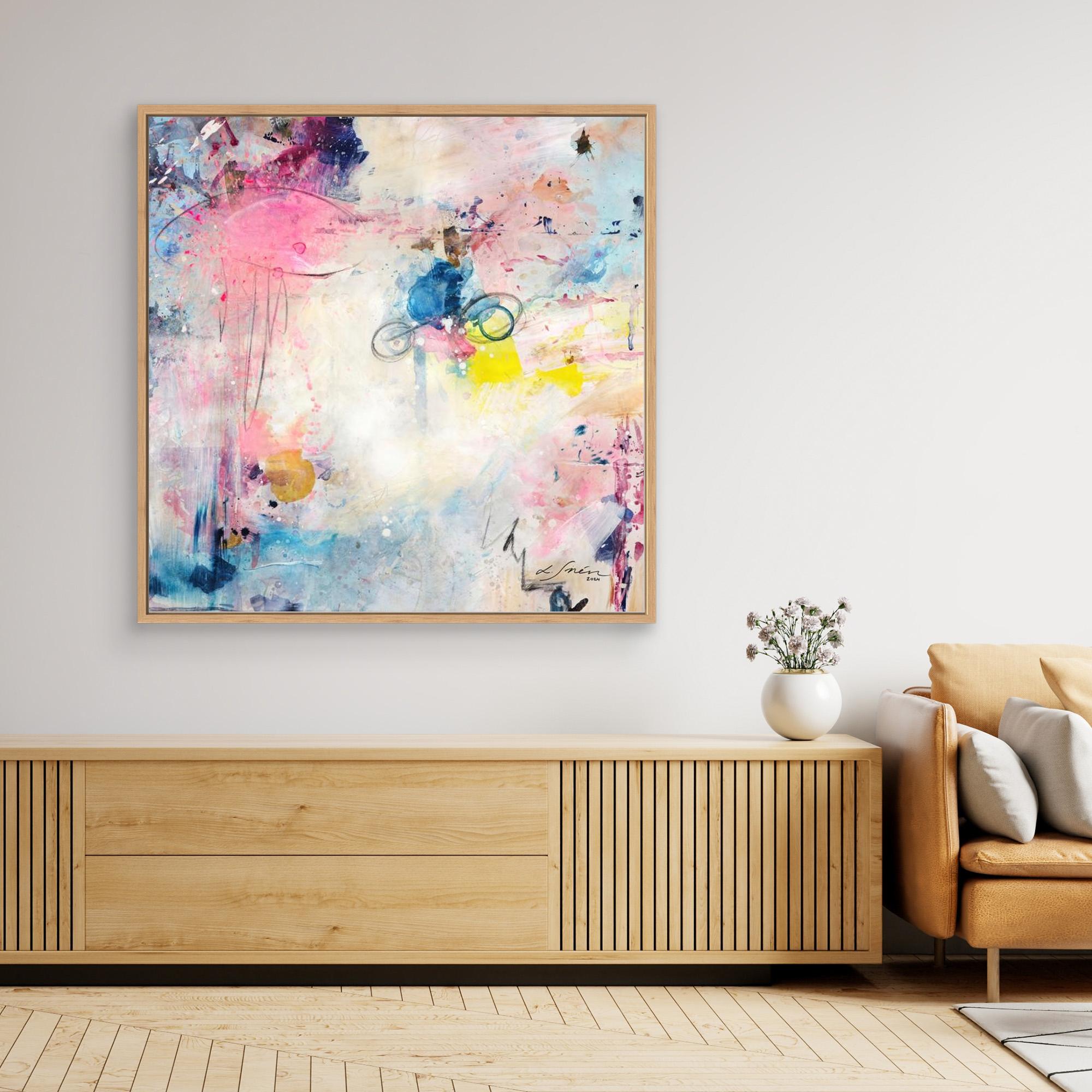 UFO (&amp; other flying vehicles) - Canvas Print A semi-abstract canvas print with oak framea wall on top of a TV-stand. A light piece with off-white, pastel tones and blue, pink and yellow hues.  