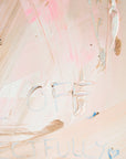 Abstract painting with thick brushstrokes in soft blush pink, cream, beige, and light blue, with faint hand-lettered text near the bottom.