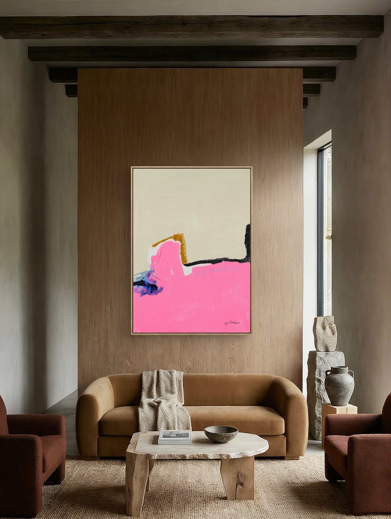 Modern japandi living room with a brown sofa, pink abstract art on the wall, and a wooden coffee table.